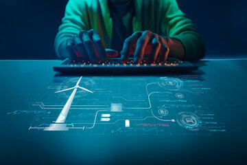 Person Working on Innovative Technology Project with Wind Turbine Concept and Digital Interface Display Related to Renewable Energy Solutions
