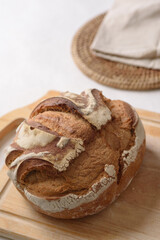 Artisan sourdough on simple white surface