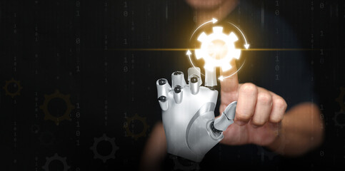 Human and robot hand collaborating to activate automation system icon, symbolizing AI technology integration, machine learning, and future innovation in digital transformation tech and business.