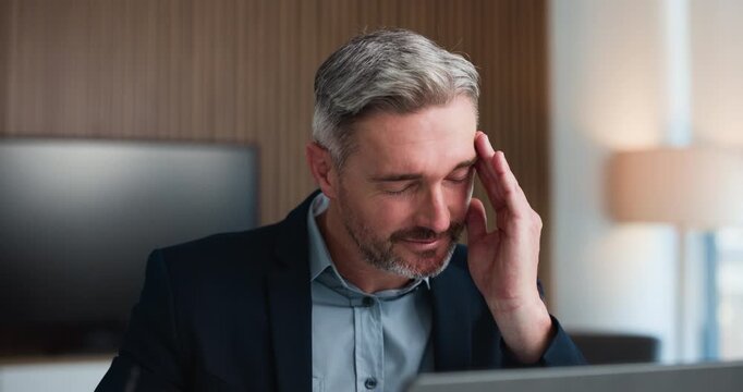 Frustrated, businessman and headache with stress on laptop for mistake or bad news in office. Tired, man or employee with eye strain on computer for rejection, deadline or financial loss in workplace