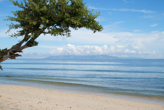 Beautiful view of Cristo Rei Backside Beach or known as Dolok Oan Beach in Dili, Timor Leste. Tropical beach background.