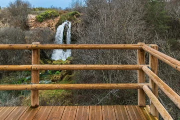 Fototapete Rund Naturpark View of Hundimiento Waterfall from the wooden viewpoint in Lagunas de Ruidera Natural Park, Spain  © M. Perfectti