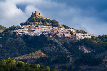Historic Segura de la Sierra village perched on a mountain with a castle on top