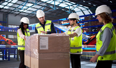 Warehouse Manager Demonstrating Efficient Pallet Wrapping Techniques