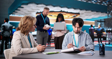 International Trade Fair Meeting: Diverse Team Promoting Employment