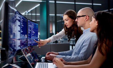 Young Engineers Leading Collaborative Coding Session