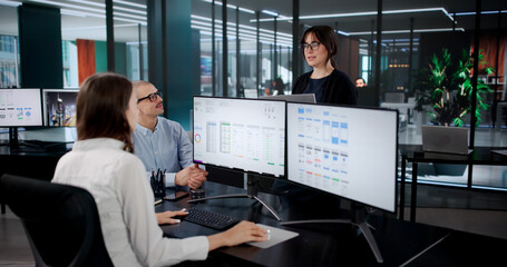 Creative Team Developing User Interfaces For Online App