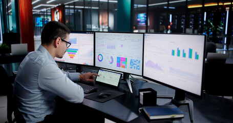 Young Hispanic Strategist Analyzing Real-time Financial Data