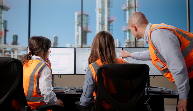 Female Technician Monitors Oil Production