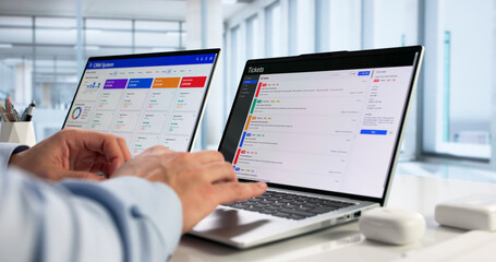 Hispanic Computer Technician Improving Website Security