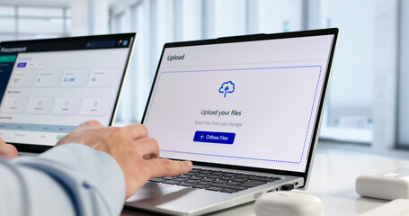 Hispanic IT Professional Uploads Secure Data