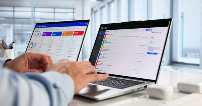 Hispanic Computer Technician Improving Website Security