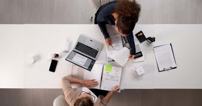 Female Accountant, Young Latina Woman, Auditing Tax Invoices