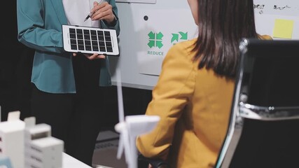 Business person meeting on solar cell panel technology. Business People Discussing Solar Power Environment Concept. Green alternative energy concept - Powered by Adobe
