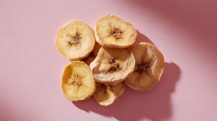 Banana Chips Stack on a Pink Background