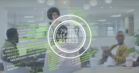 Presenting woman in striped top leading team meeting at open office with projected code HUD