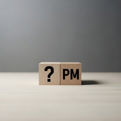 A wooden block puzzle with a question mark and pm letters on a plain surface