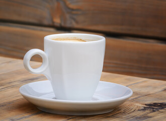 White coffee cup on a blurred background