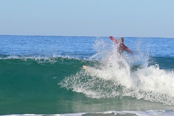 Surfing in the Atlantic Ocean , clear water and perfect waves © GenadiyGM