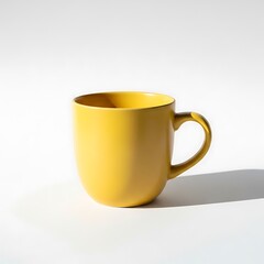 Yellow ceramic coffee mug with handle on white surface and background