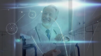 Animation of network of connections over caucasian male doctor on wheelchair using digital tablet