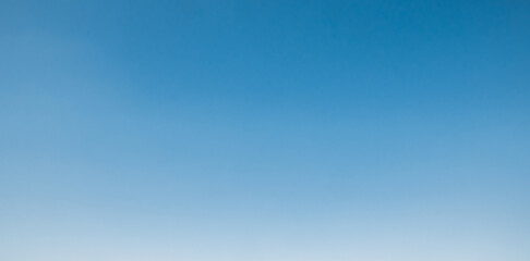 the sky is clear blue with only a few clouds.