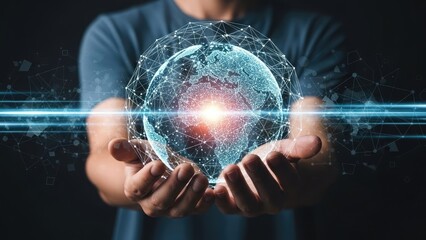 Man holding glowing sphere representing global network and future technology.
