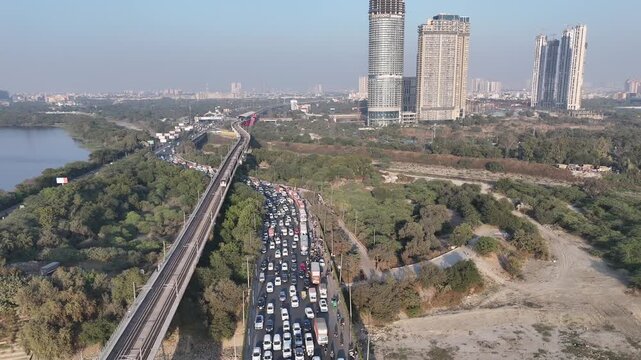An Aerial Shot of Delhi Metro at Kalindi Kunj Bridge in Delhi, NCR, India
