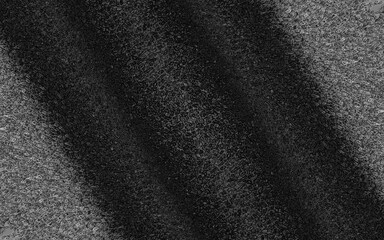 This dark black and gray ripple texture features chaotic noise waves and liquid distortion patterns, ideal for creative backgrounds, posters, wallpapers and graphic design projects.