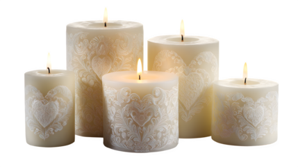 Decorative pillar candles with heart motifs isolated on transparent background
