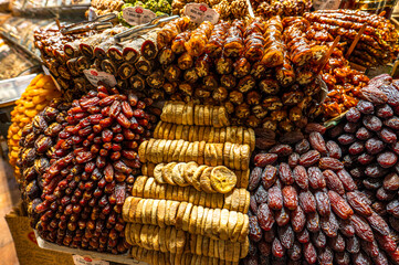 Istanbul, Turkey - January 03, 2026: Traditional Turkish sweets, dried figs and dates displayed at a stall in the Egyptian Bazaar