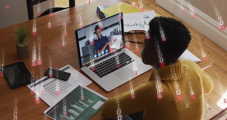 Animation of binary coding over african american woman having a video call on laptop at home - Powered by Adobe