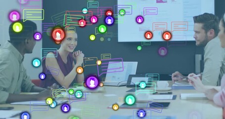 Animation of neon profile and message icons over diverse colleagues discussing together at office - Powered by Adobe