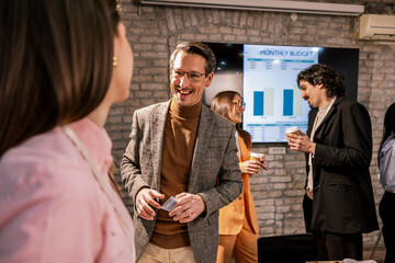 Colleagues Discussing Work on Coffee Break