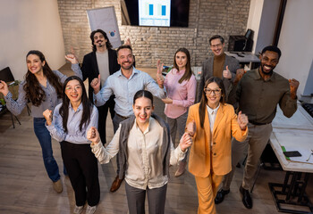 CEO and Colleagues Celebrating in Office