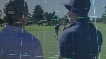 Golfer lining up putt on green, senior spectators using grid overlay for technology analysis - Powered by Adobe