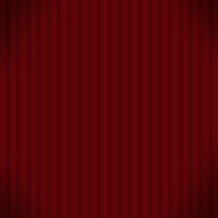 Red velvet stage curtain background with soft folds and lighting