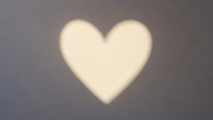 Heart shape shadow on gray background