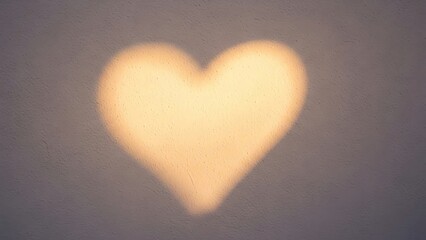 Heart shape shadow on wall