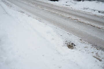 Slush ice, slurry mixture of small ice crystals, snow and liquid water. Slush forms when ice or snow melts during mixed precipitation with dirt and pollutants, resulting in gray or muddy brown color.
