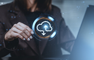 Woman interacting with cloud storage hologram interface on futuristic digital background conceptually representing global file transfer services.