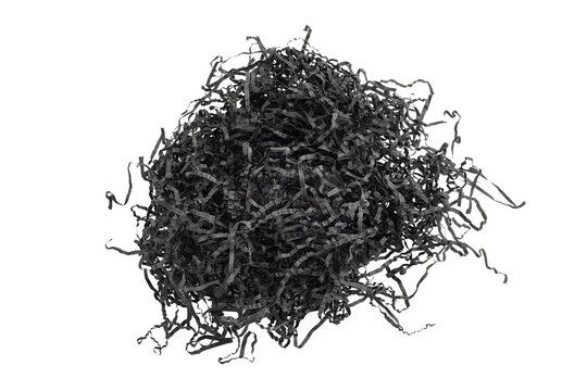 Black box filler. Finely shredded kraft paper isolated on white background.