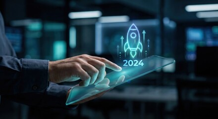 White Adult Man Pointing at Glowing Holographic Rocket with 2024 Label and Upward Arrows for Business Growth, Corporate Startup Success Concept in Dark Office