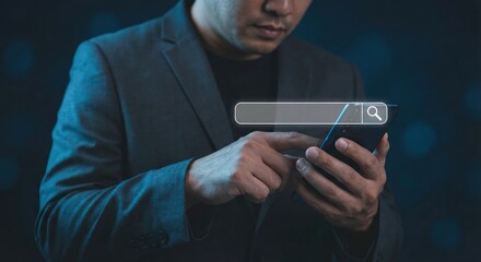 Adult East Asian man in a professional suit using a smartphone with a glowing digital search bar overlay for internet data browsing and SEO concept in a dark indoor setting.