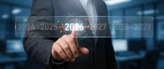 Professional adult white man in a suit selecting the year 2026 on a glowing digital timeline interface for business strategy and future planning in a modern office environment