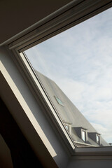 Fen&ecirc;tre de toit sur un immeuble en hauteur