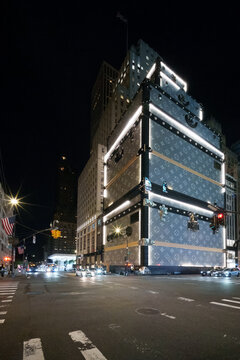 NEW YORK CITY - 16.September 2025, Large-scale experiential marketing installation by Louis Vuitton in New York City. A giant designer suitcase rises above the sidewalk.