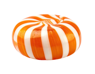 Swirled orange and white hard candy, isolated against black