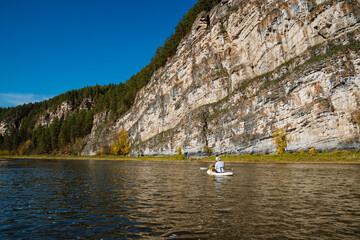 Embark on an unforgettable paddling adventure through stunning autumn cliffs, surrounded by...
