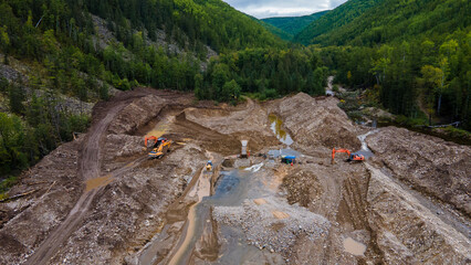 View from above. Mining of loose gold. A river destroyed by gold miners. A developed field in the...